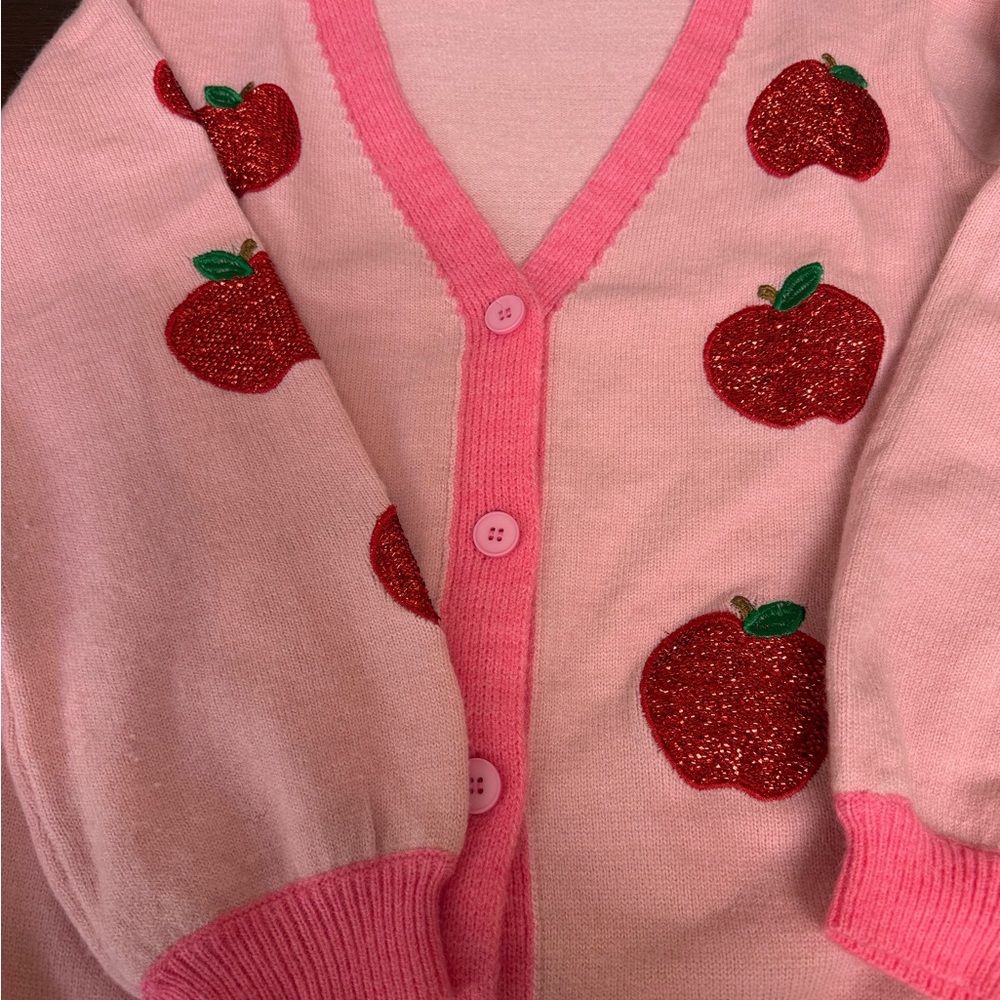 Charming Pink Cardigan with Glittery Apple Embellishments